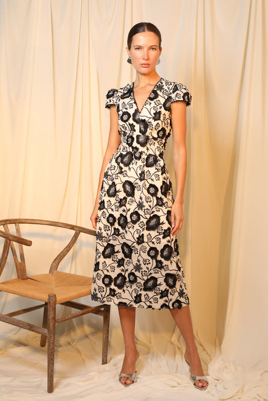 Embroidered v-neck midi wedding guest dress and graduation dress front model view