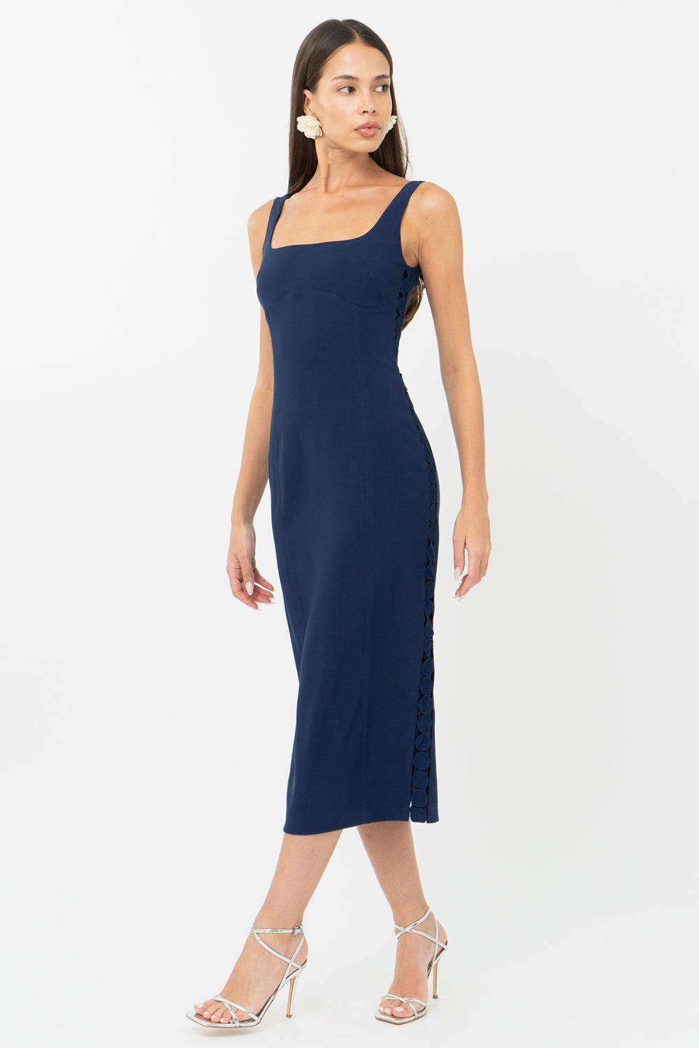 Navy blue bodycon midi wedding guest dress and graduation dress front studio view walking