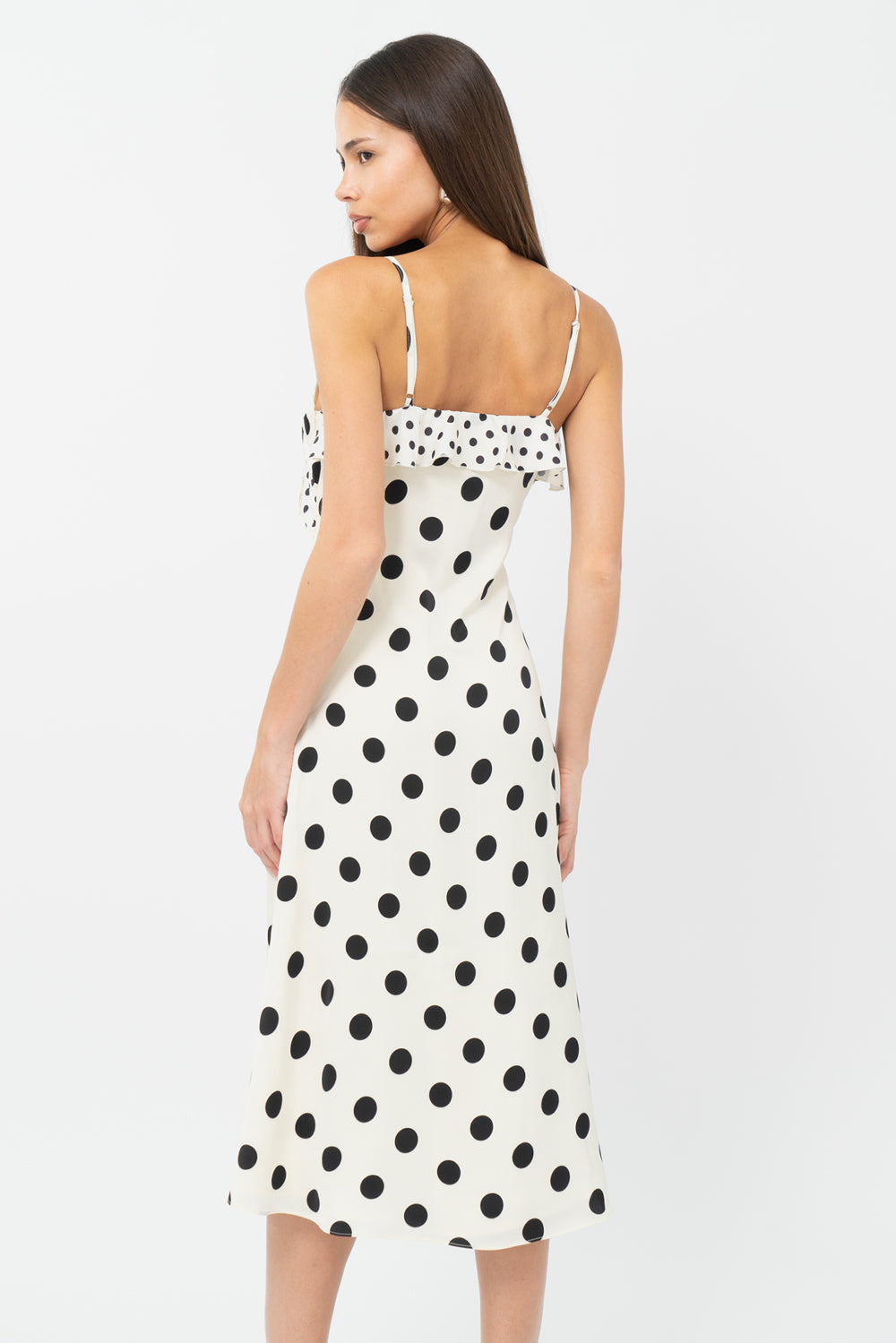 black and cream Polka dot wedding guest dress and graduation dress with ruffles back studio view